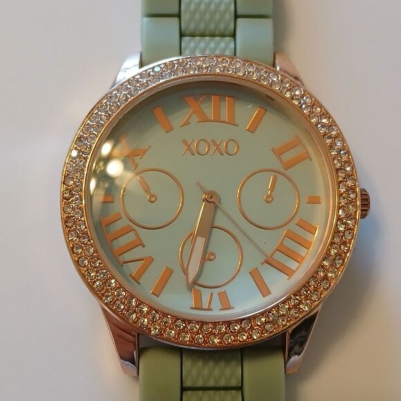 XOXO Women's Rhinestone Accented Rose Gold Watch With Green Silicone Strap - Picture 2 of 14